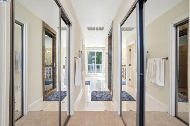 a bath tub sitting in a room next to a window