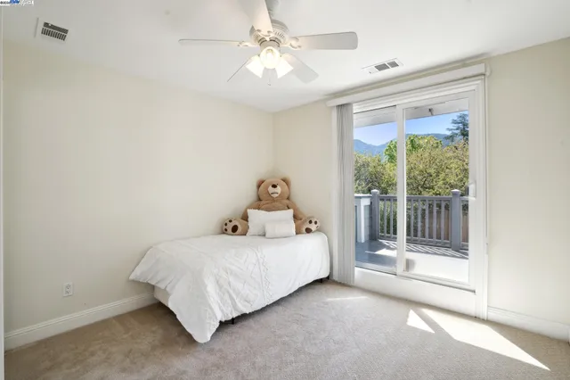a kitchen with granite countertop a sink and dishwasher wooden cabinets with a granite countertops