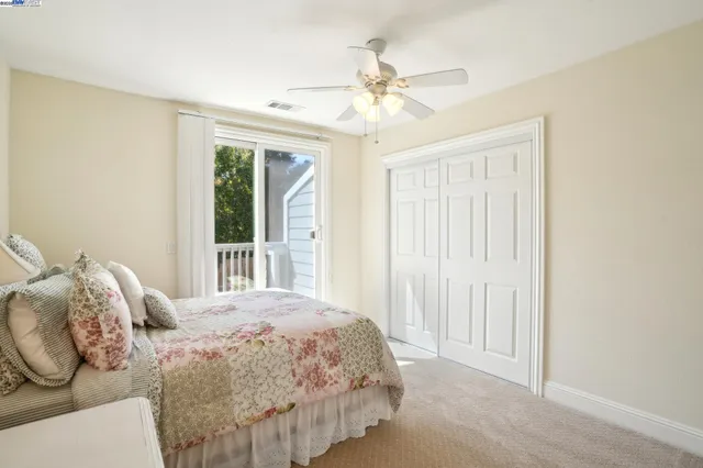 a utility room with granite countertop a sink a washer and dryer