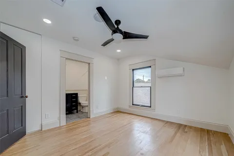 a view of a kitchen with wooden floor