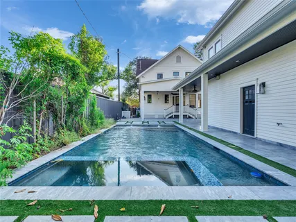 a view of a backyard with a tub