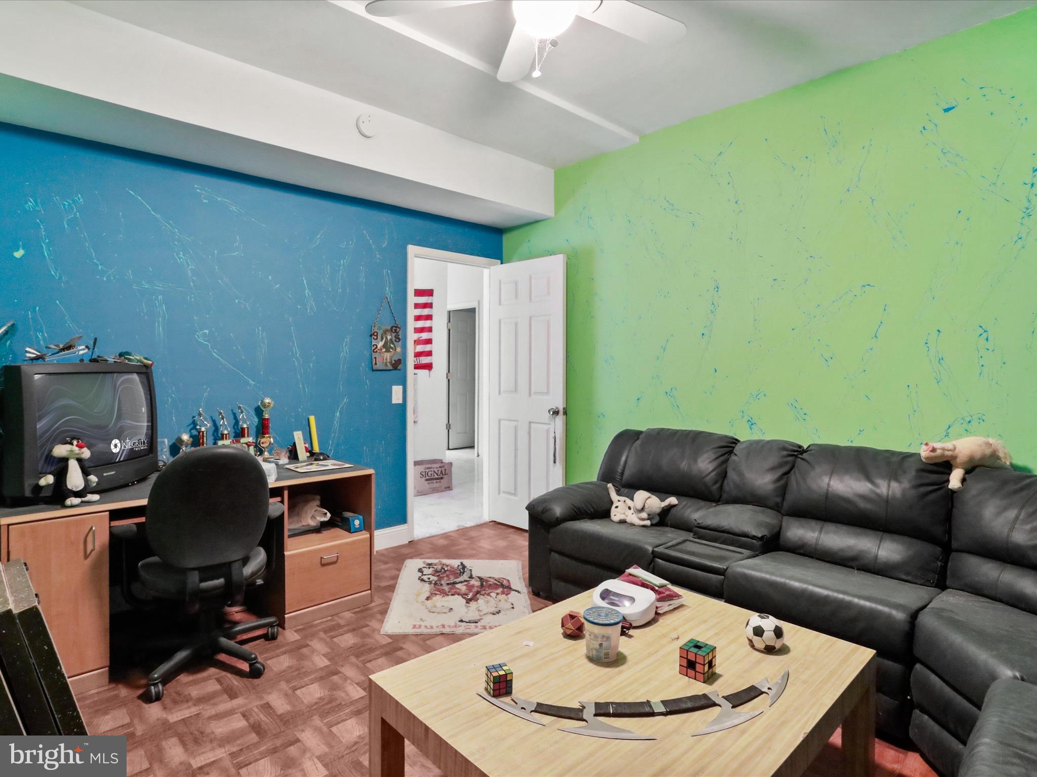 525 Rolling Rock Road Star Tannery, VA 22654 - Photo 13 of 69 a work room with furniture and a wooden floor
