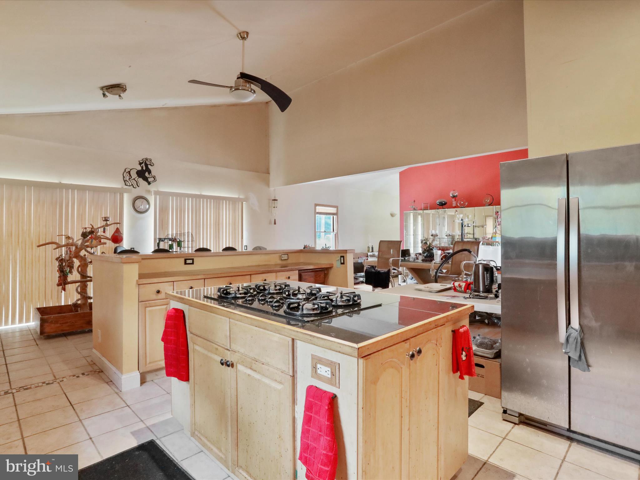 525 Rolling Rock Road Star Tannery, VA 22654 - Photo 18 of 69 a kitchen with stainless steel appliances granite countertop a sink stove and refrigerator