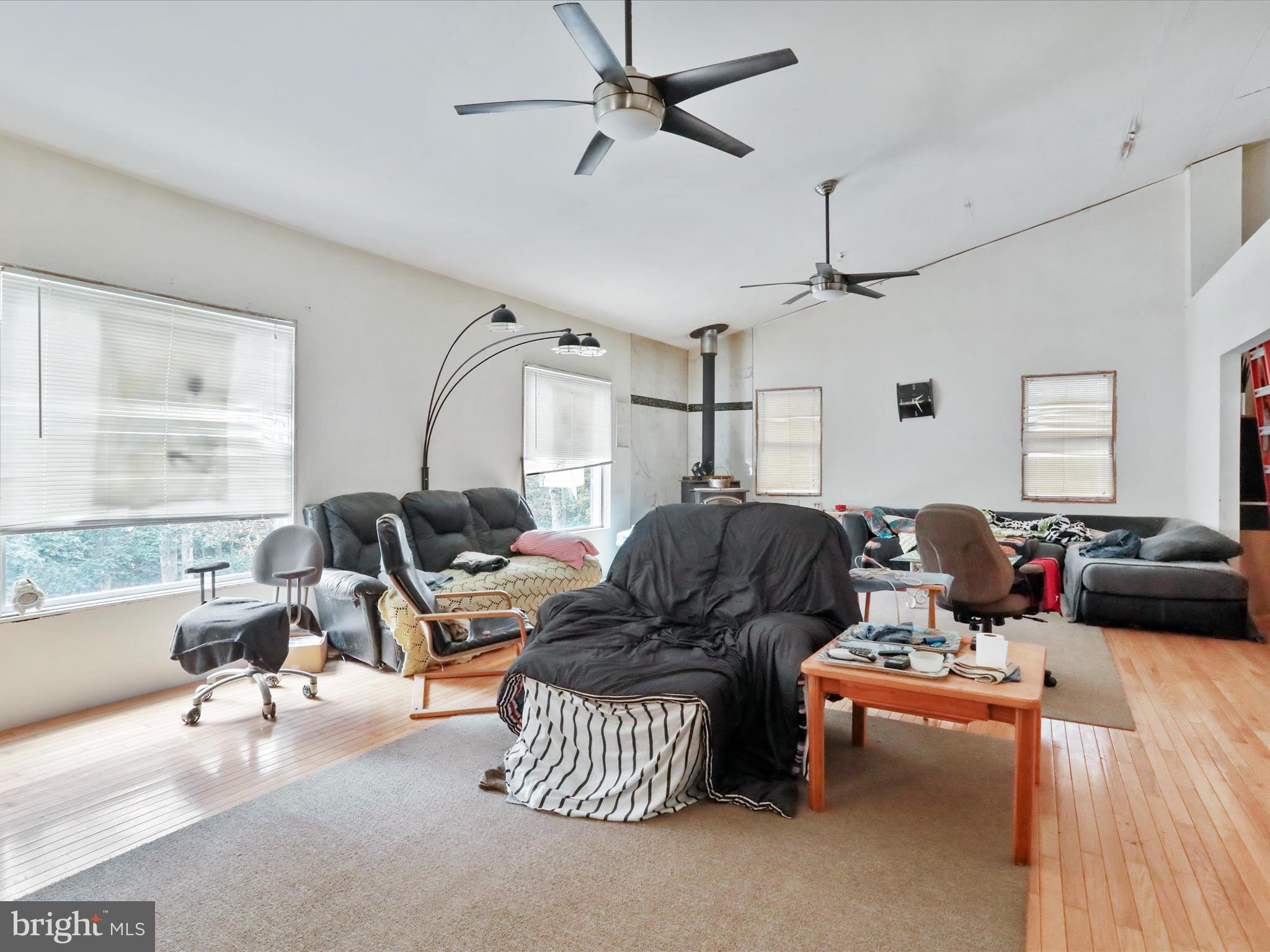 525 Rolling Rock Road Star Tannery, VA 22654 - Photo 23 of 69 a living room with furniture and a large window