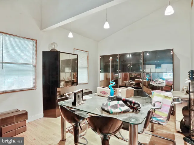 a bathroom with a sink toilet tub and shower