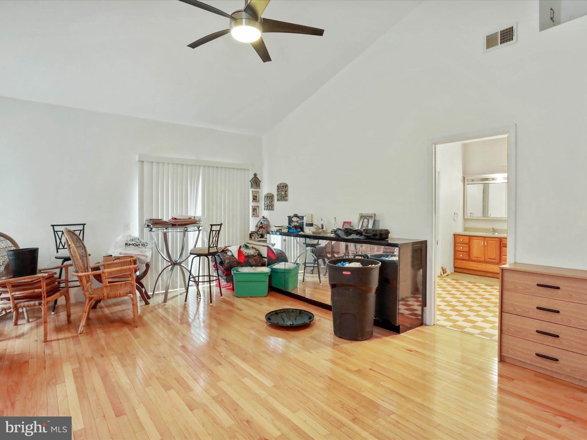 525 Rolling Rock Road Star Tannery, VA 22654 - Photo 30 of 69 a living room with furniture and a wooden floor