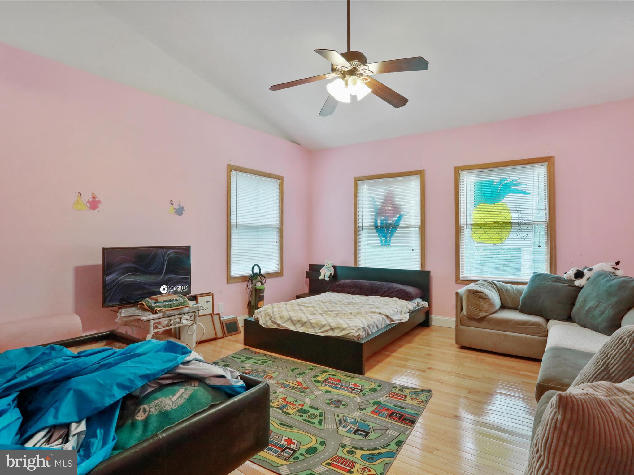 525 Rolling Rock Road Star Tannery, VA 22654 - Photo 38 of 69 a bedroom with two beds and a chandelier