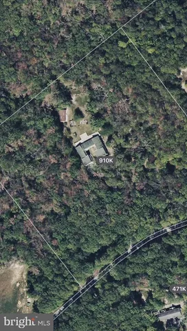 a view of a room with wooden floor and small space