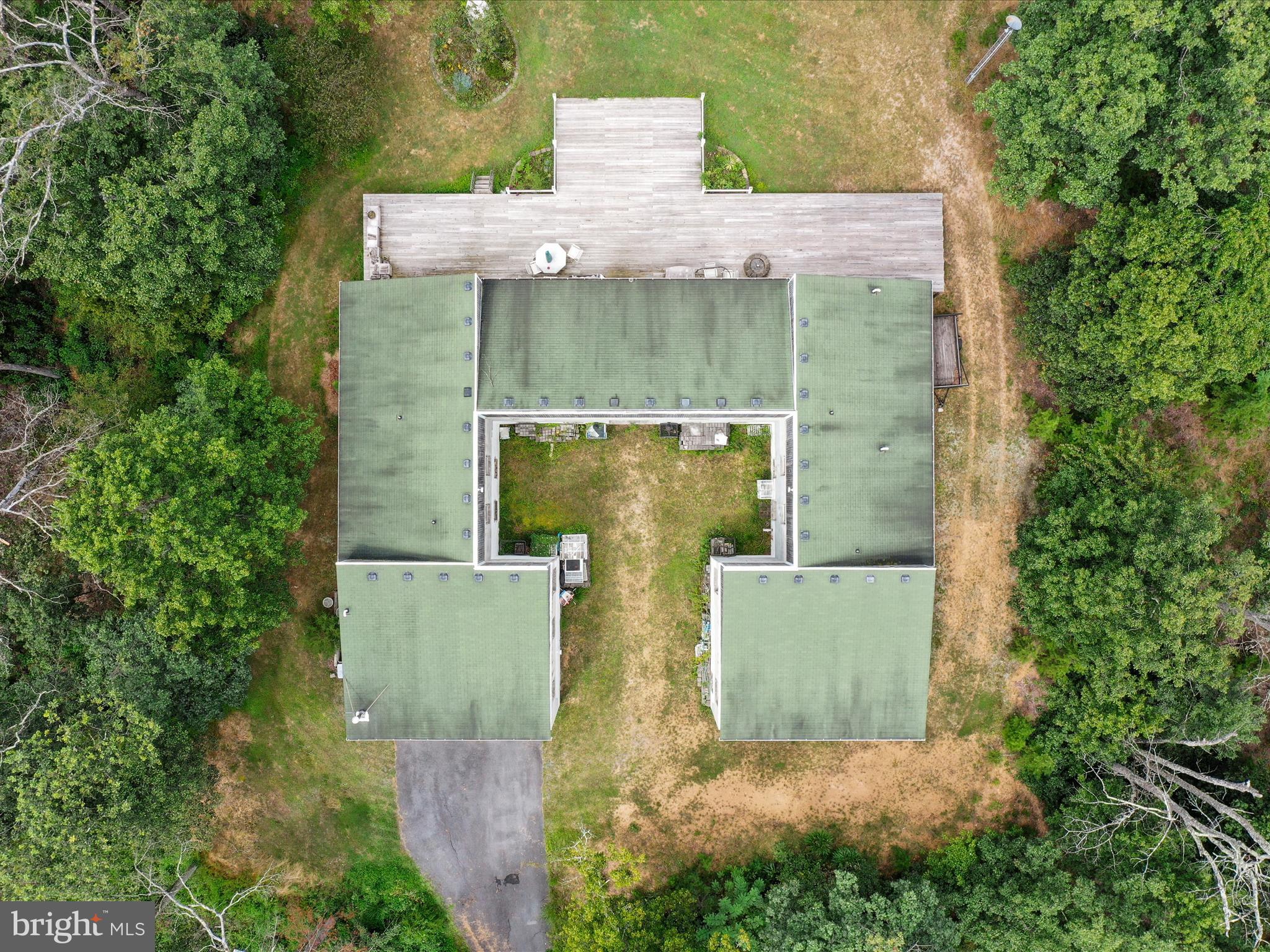 525 Rolling Rock Road Star Tannery, VA 22654 - Photo 68 of 69 an aerial view of a house with a yard and large trees