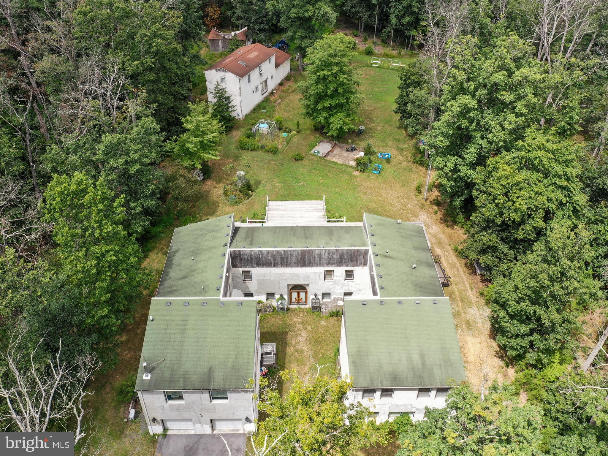 525 Rolling Rock Road Star Tannery, VA 22654 - Photo 69 of 69 an aerial view of a house with swimming pool and large trees