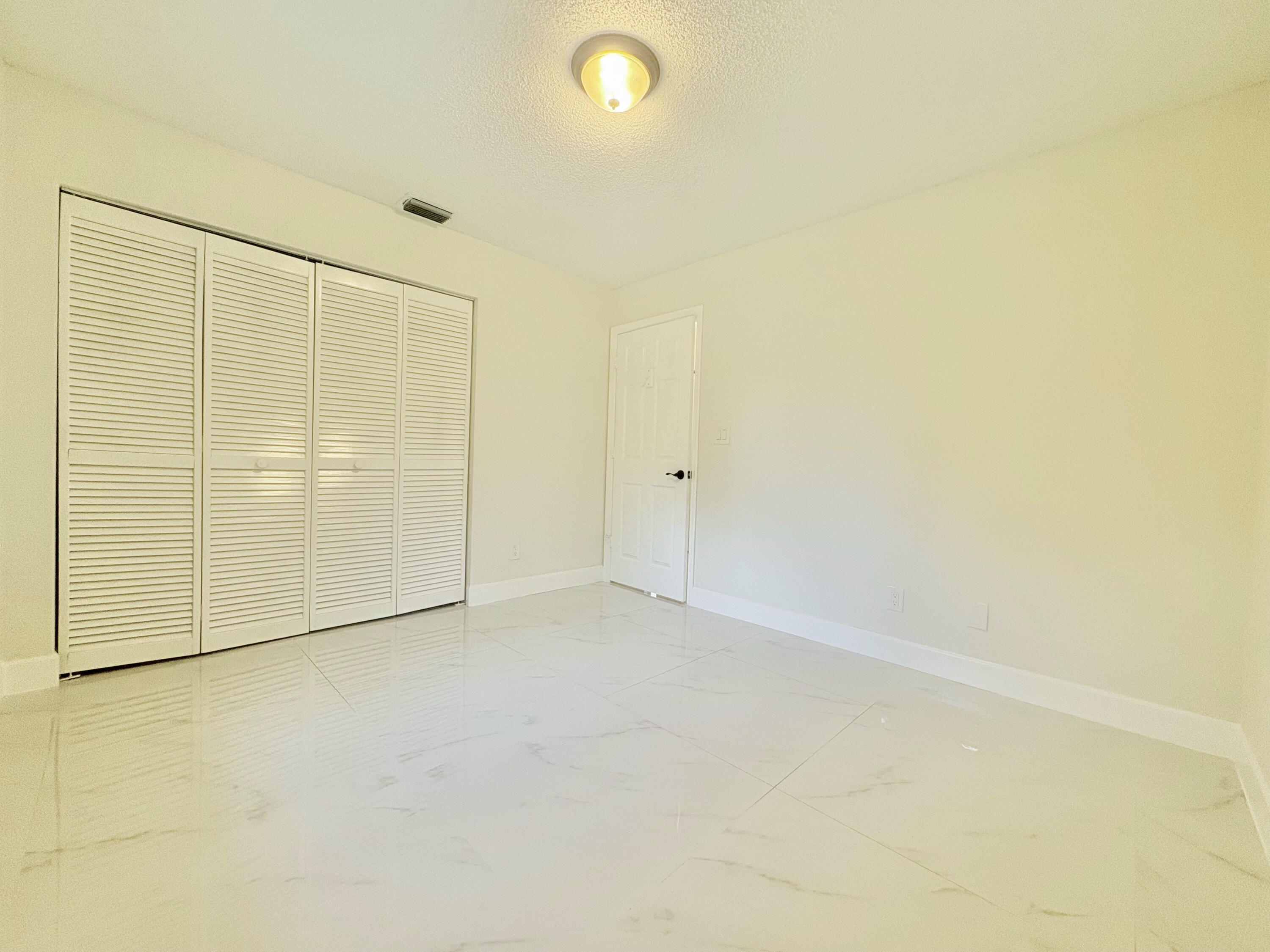 14523 Flamingo Road Loxahatchee Groves, FL 33470 - Photo 36 of 50 a view of an empty room