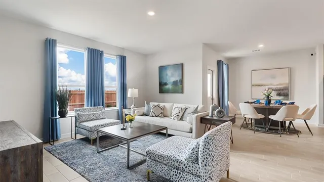 a kitchen with a dining table and chairs