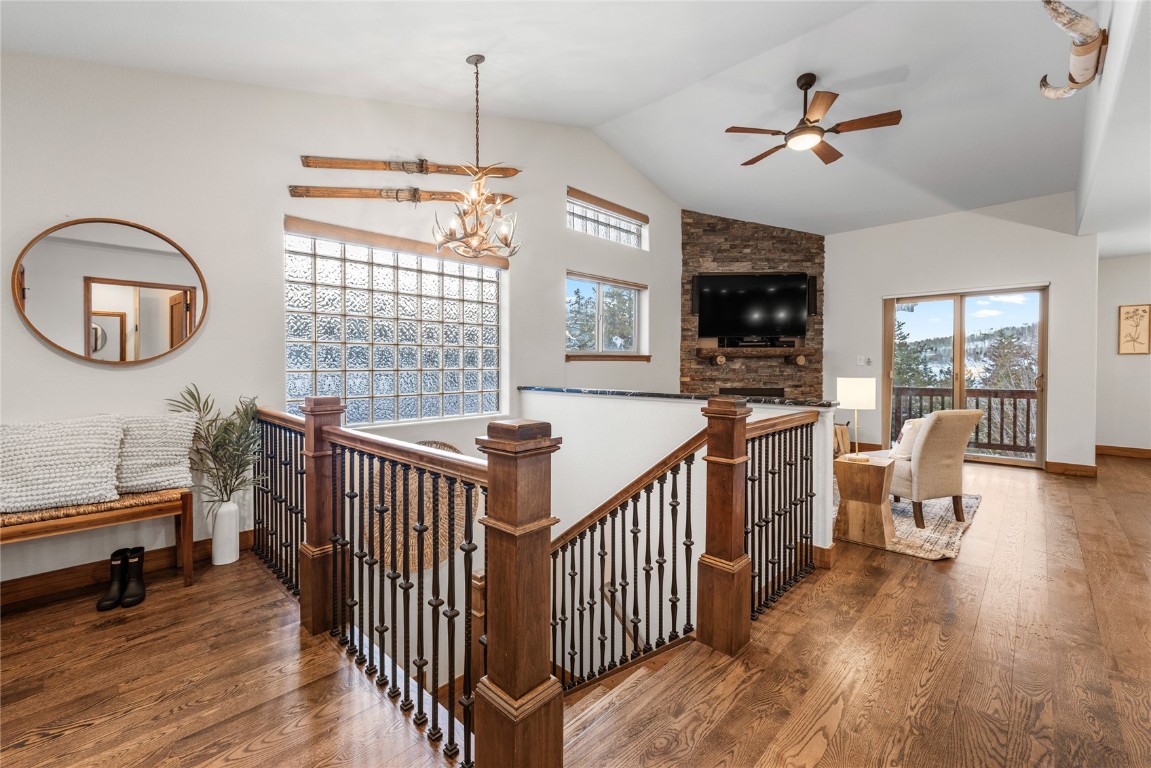 83 Lookout Ridge Drive, Unit 83 Dillon, CO 80435 - Photo 7 of 25 a view of a livingroom with furniture a bedroom wooden floor and windows