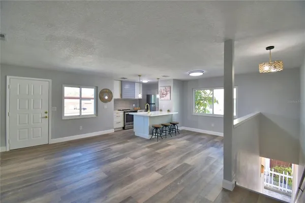 a view of a kitchen from a dining room