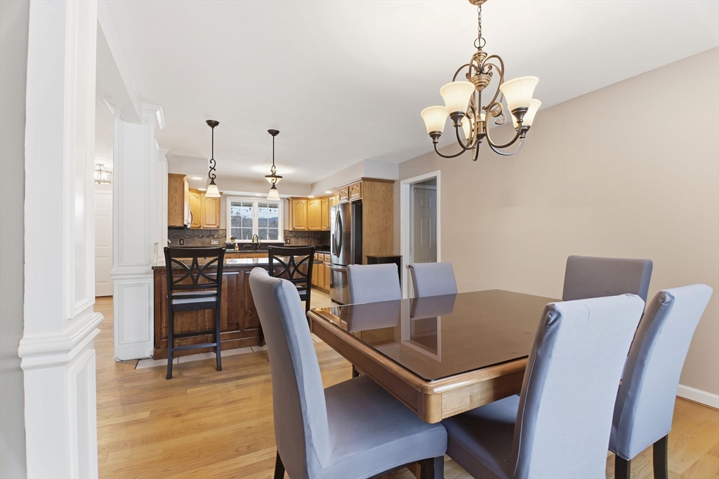 2 John Mason Road Southwick, MA 01077 - Photo 12 of 41 a view of a dining room with furniture and chandelier