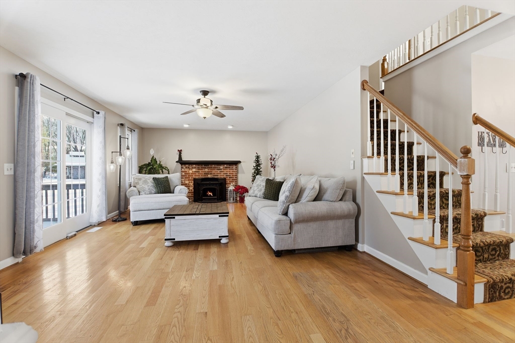 2 John Mason Road Southwick, MA 01077 - Photo 13 of 41 a living room with furniture and a fireplace