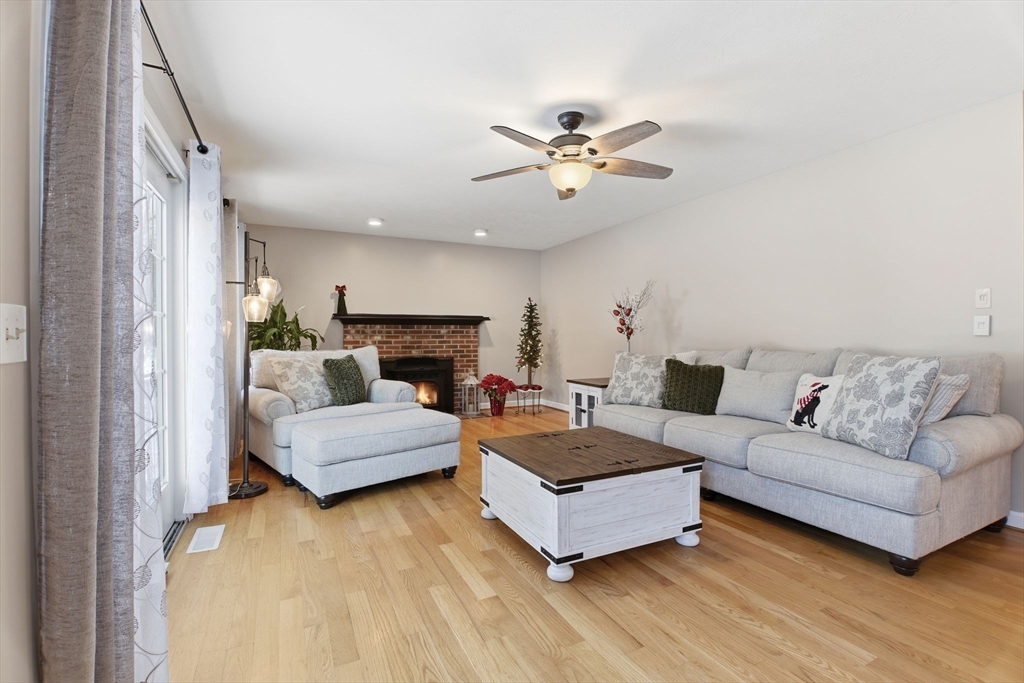 2 John Mason Road Southwick, MA 01077 - Photo 14 of 41 a living room with furniture and a fireplace