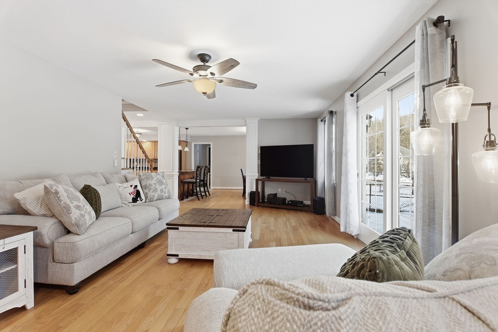 2 John Mason Road Southwick, MA 01077 - Photo 16 of 41 a living room with furniture ceiling fan and a flat screen tv