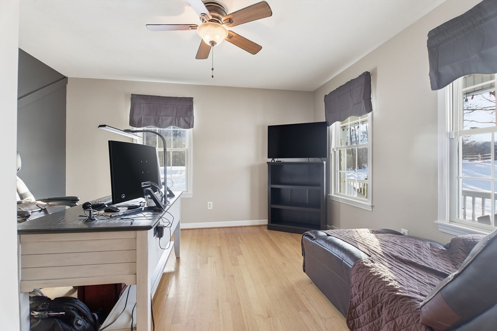 2 John Mason Road Southwick, MA 01077 - Photo 17 of 41 a living room with furniture and a flat screen tv