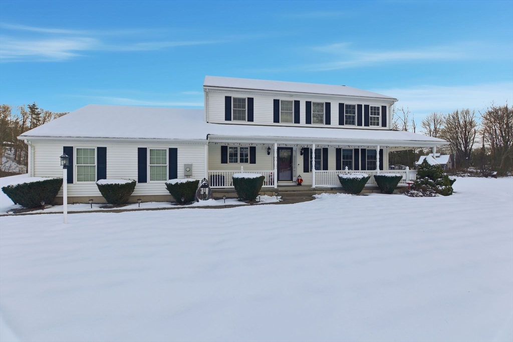 2 John Mason Road Southwick, MA 01077 - Photo 2 of 41 a swimming pool with outdoor seating and yard