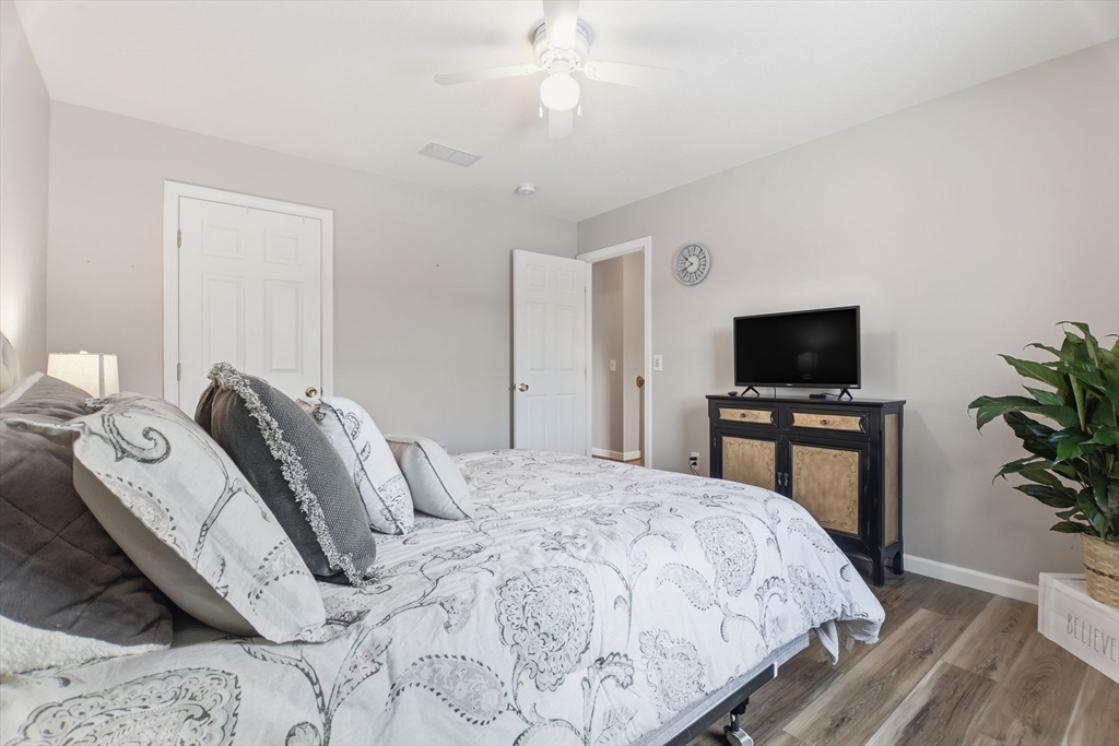 2 John Mason Road Southwick, MA 01077 - Photo 27 of 41 a bedroom with a bed and a flat screen tv