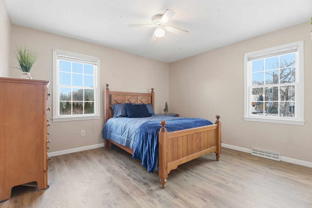 2 John Mason Road Southwick, MA 01077 - Photo 28 of 41 a bed sitting in a bedroom next to a window