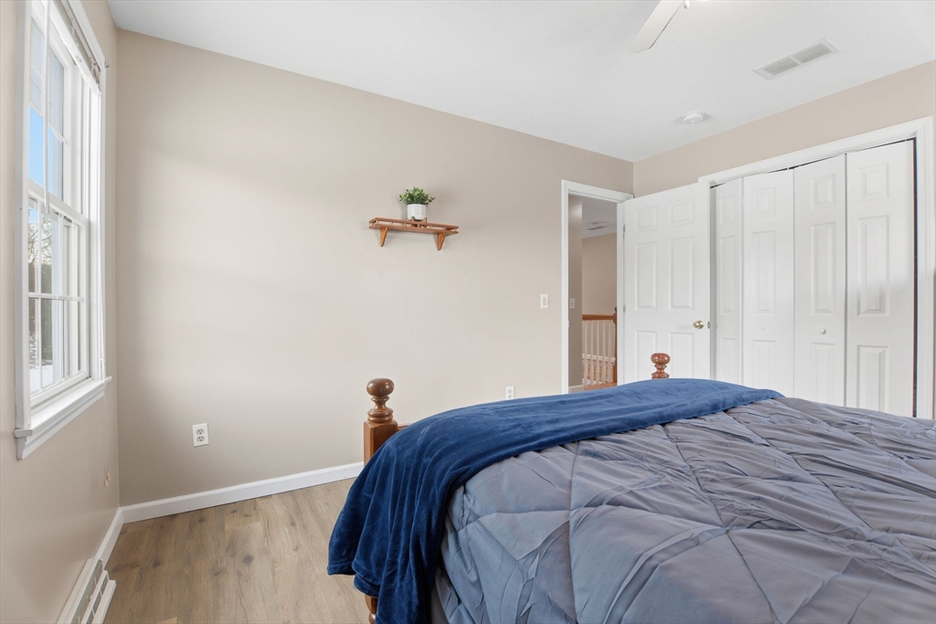 2 John Mason Road Southwick, MA 01077 - Photo 30 of 41 a bedroom with a bed and a window