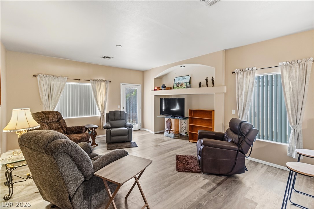 2823 Rippling Springs Street Laughlin, NV 89029 - Photo 23 of 89 Living room with light wood finished floors and baseboards