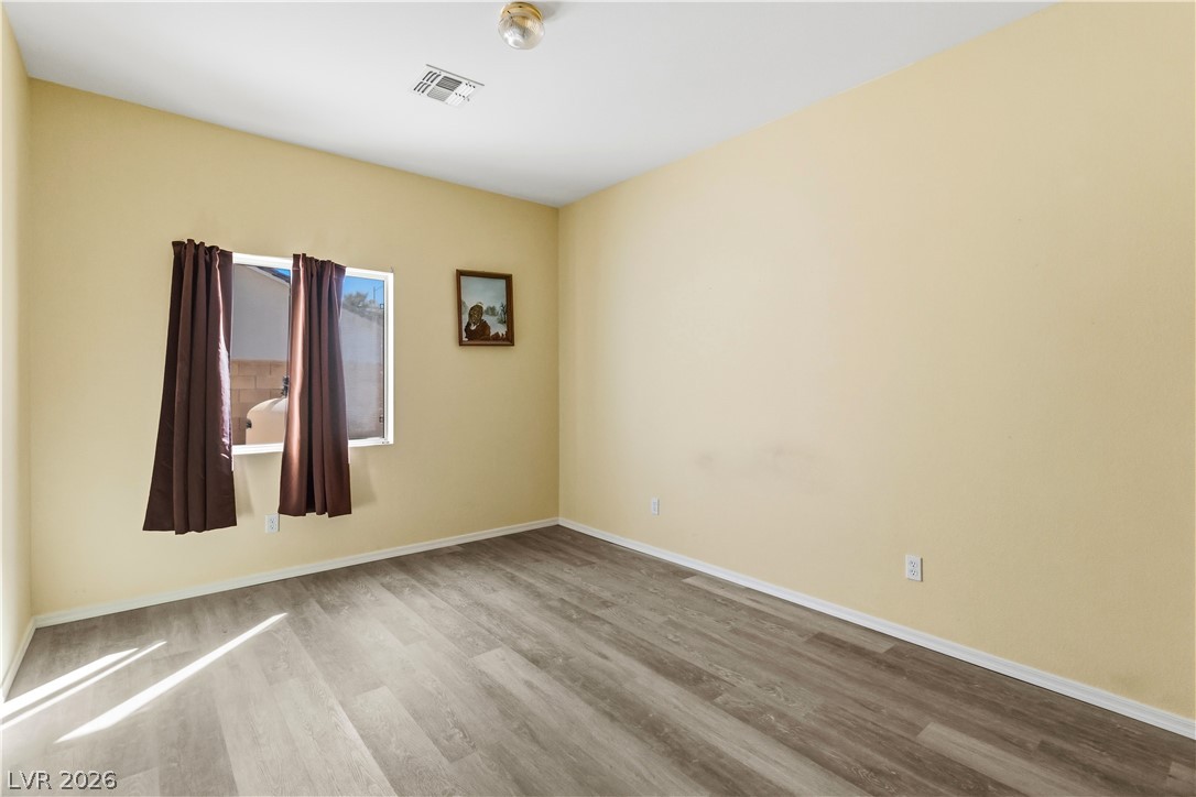 2823 Rippling Springs Street Laughlin, NV 89029 - Photo 42 of 89 Second room with light wood-style flooring and baseboards