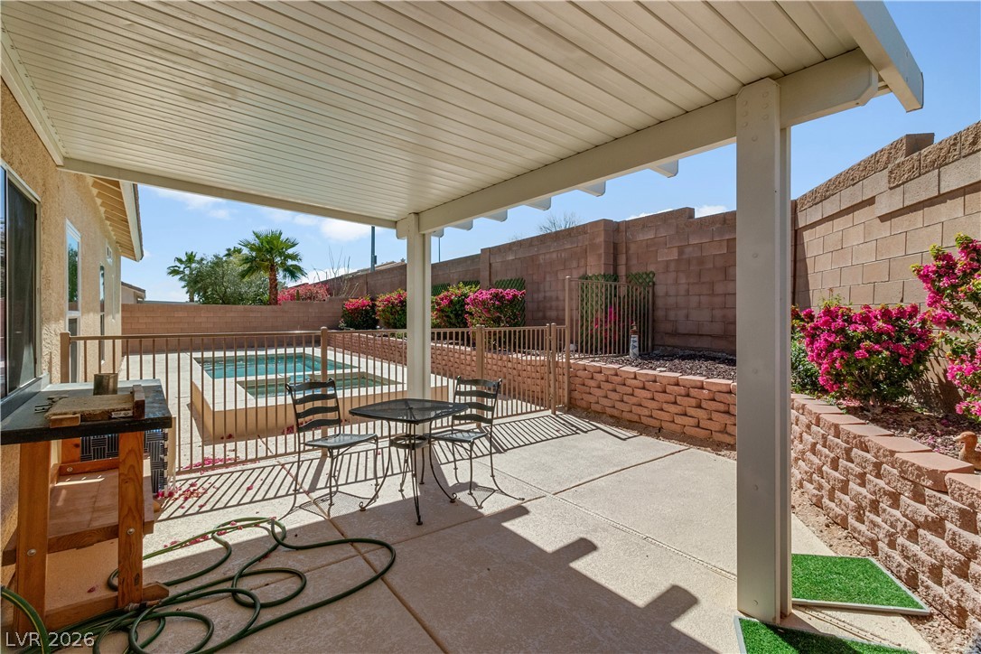 2823 Rippling Springs Street Laughlin, NV 89029 - Photo 54 of 89 Fenced backyard featuring a patio area and outdoor dining area