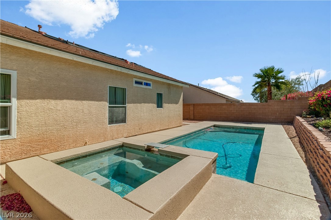 2823 Rippling Springs Street Laughlin, NV 89029 - Photo 59 of 89 Relaxing pool / spa with a patio and a fenced backyard