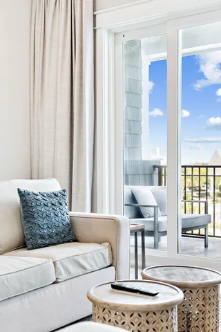 a bedroom with a flat screen television and a bed