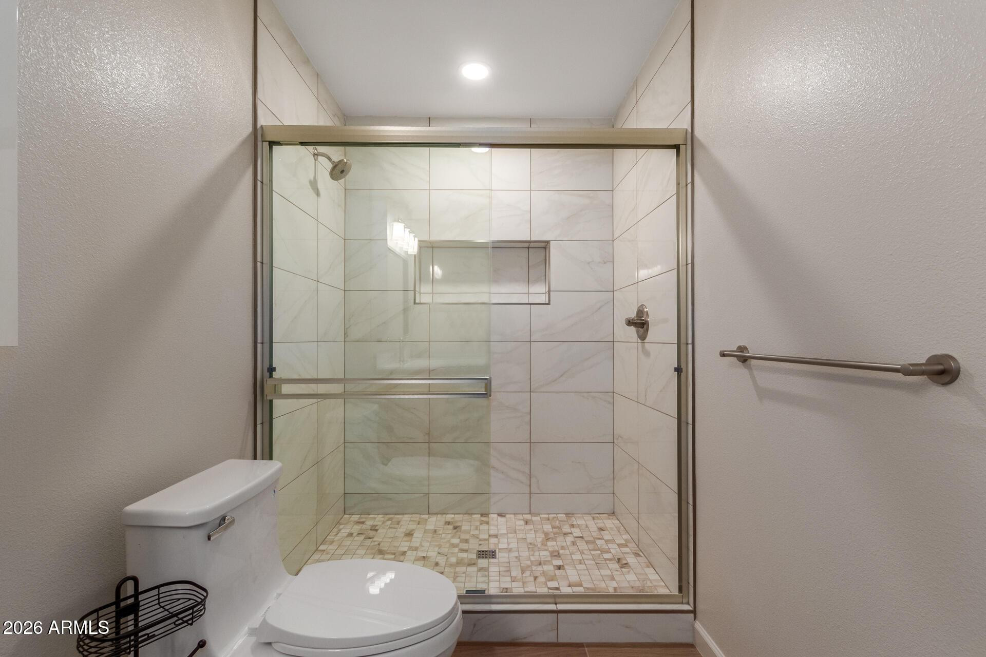 1628 East Del Rio Drive Tempe, AZ 85282 - Photo 16 of 32 a bathroom with a shower and a toilet
