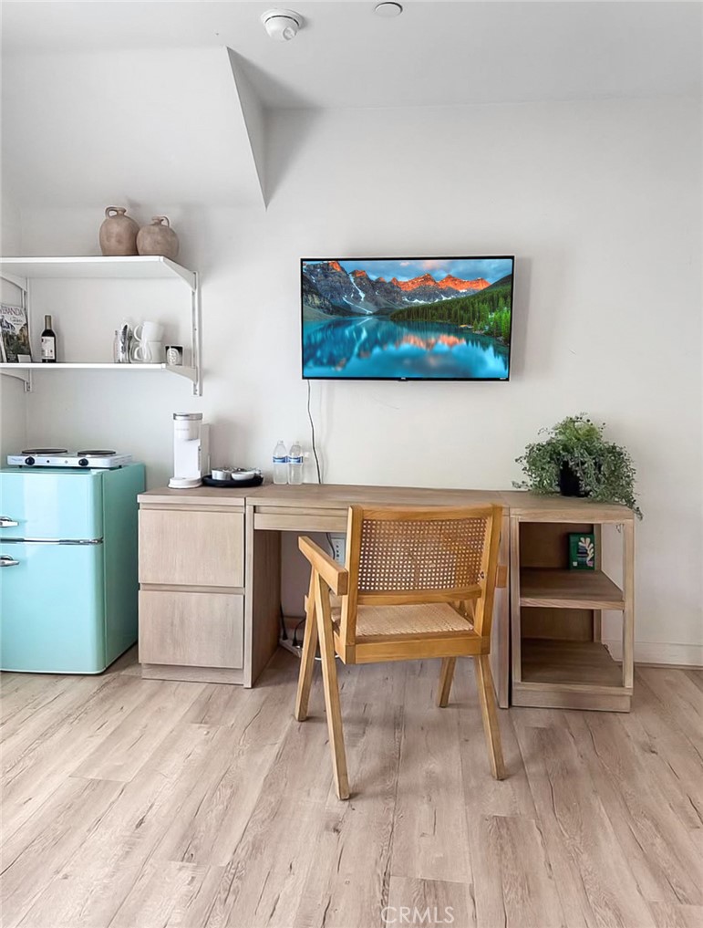 2581 Arvia Street, Unit 3 Los Angeles, CA 90065 - Photo 25 of 52 a living room with furniture and a wooden floor