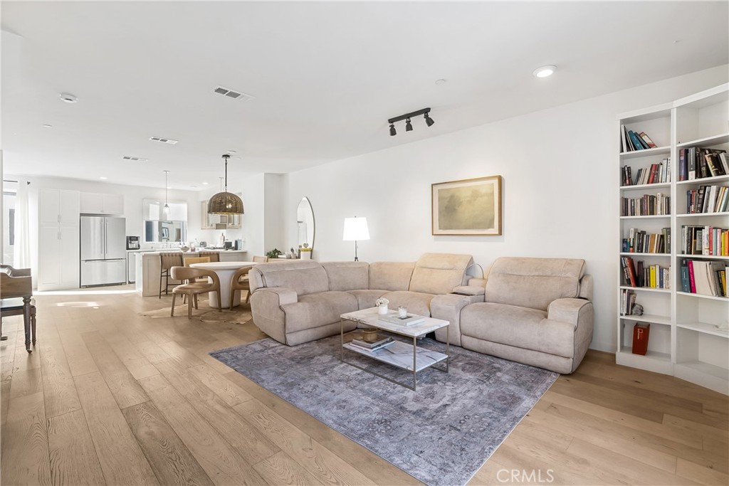 2581 Arvia Street, Unit 3 Los Angeles, CA 90065 - Photo 51 of 52 a living room with furniture and a book shelf