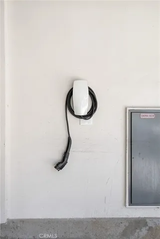 a bathroom with a shower and a mirror