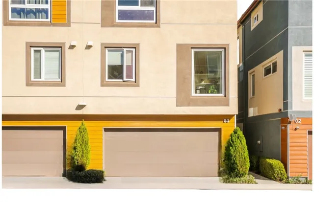 a view of a building with sitting area