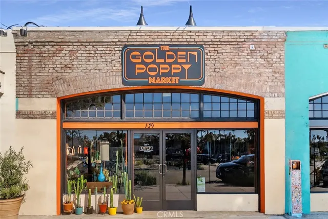 a view of a swimming pool with a yard