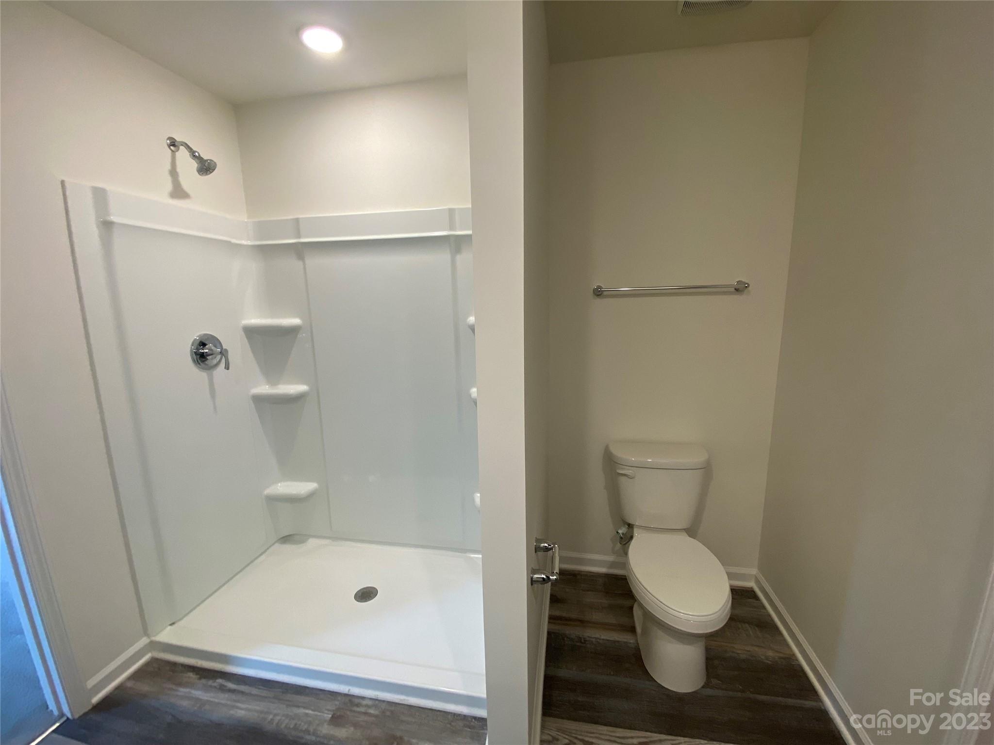 345 Corinth Church Road Mount Ulla, NC 28125 - Photo 12 of 12 a bathroom with a toilet and a shower