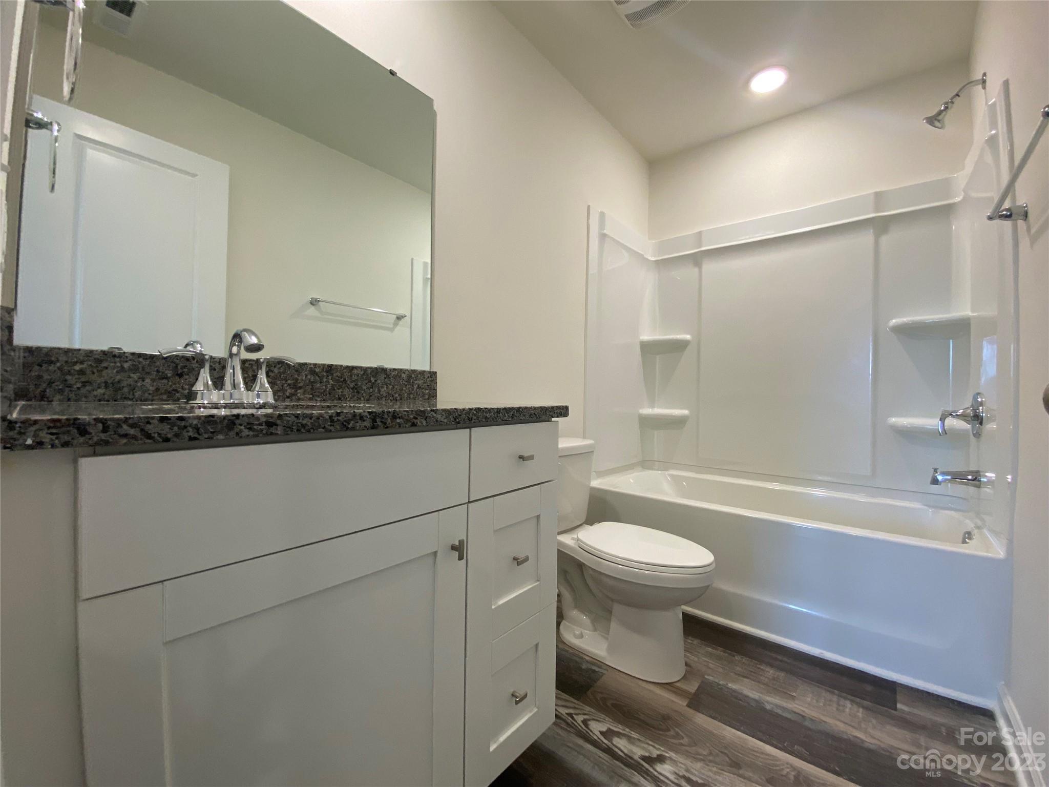 345 Corinth Church Road Mount Ulla, NC 28125 - Photo 9 of 12 a bathroom with a sink a toilet and shower