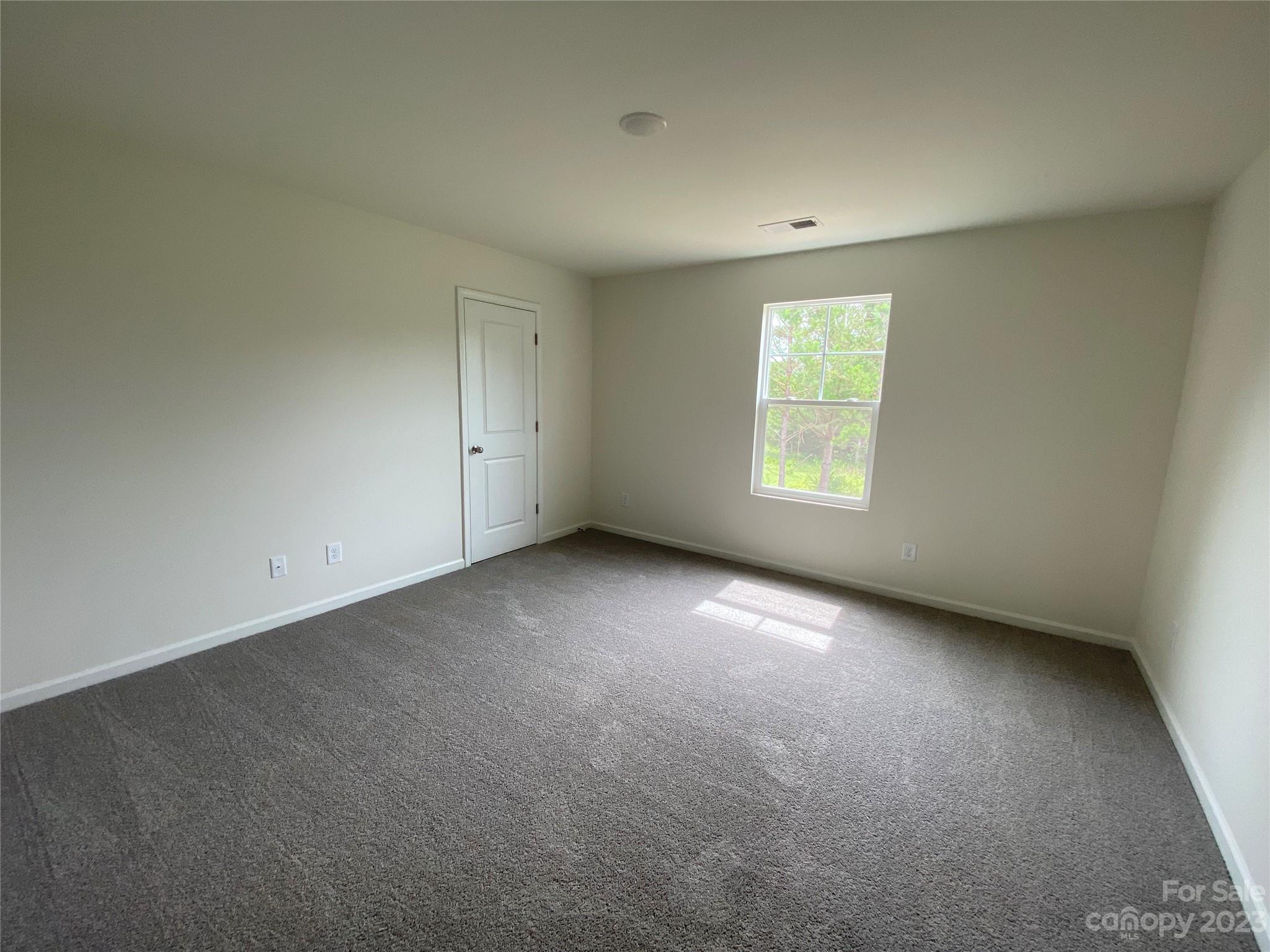 345 Corinth Church Road Mount Ulla, NC 28125 - Photo 10 of 12 an empty room with a window and closet