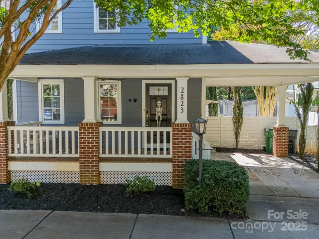 a front view of a house with a porch