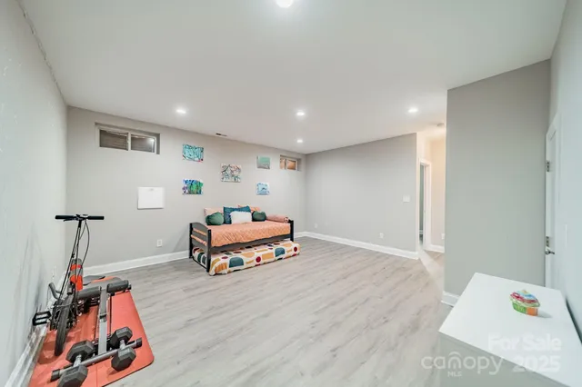 a room with furniture and wooden floor