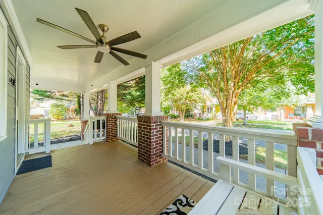 a view of a room with wooden floor and balcony