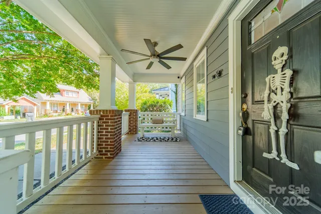 a view of a porch with wooden floor