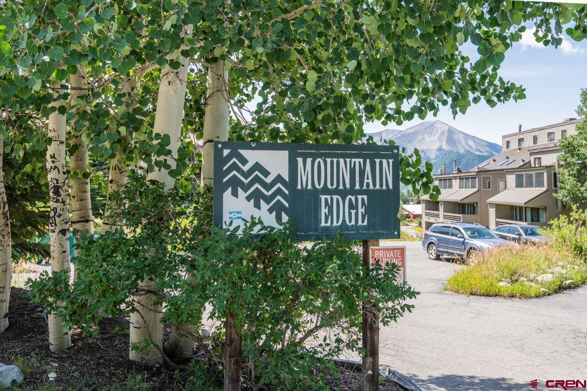 11 Hunter Hill Road, Unit 307 Crested Butte, CO 81225 - Photo 31 of 34 an aerial view of a house with garden space and street view