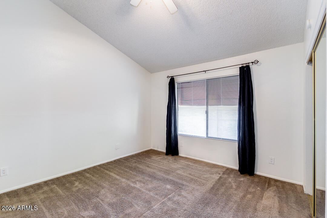 2149 East 10th Street, Unit 3 Tempe, AZ 85281 - Photo 6 of 14 a view of an empty room and window