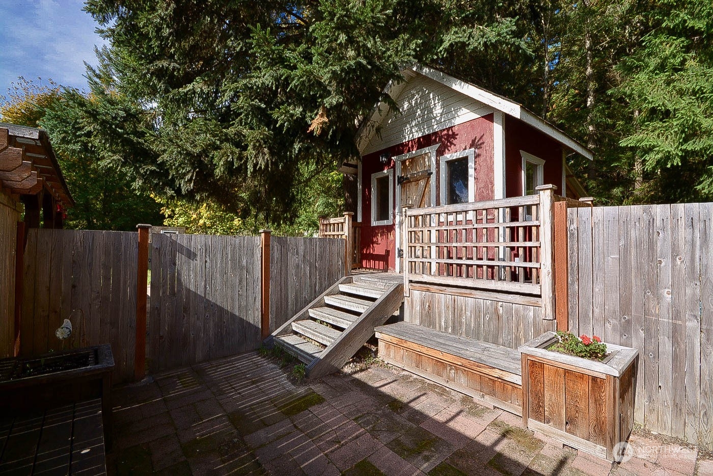 38304 Allen Road South Roy, WA 98580 - Photo 15 of 39 a view of backyard with deck and wooden fence
