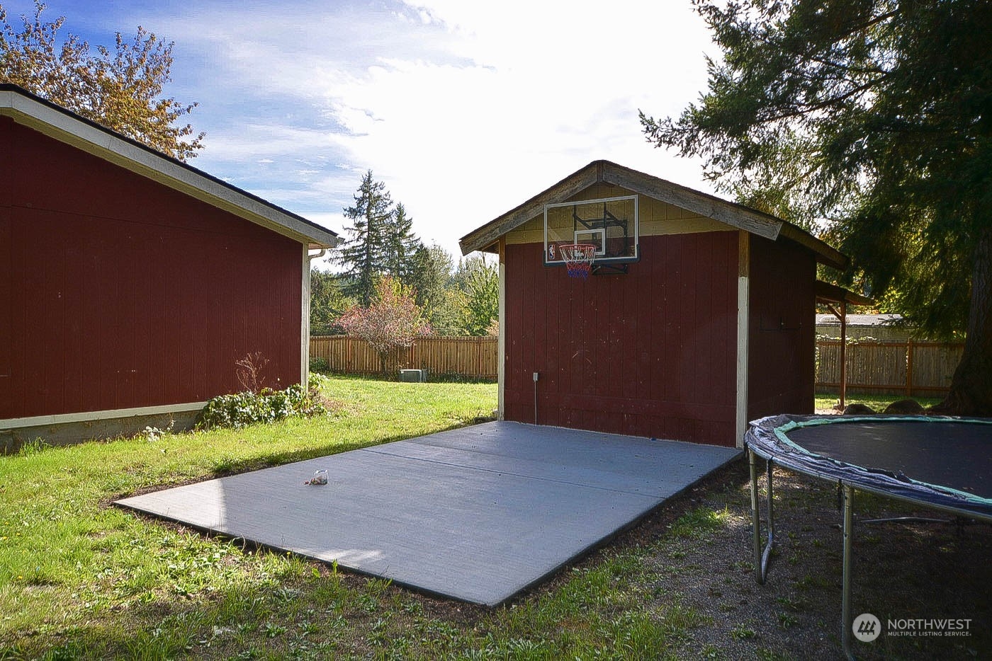 38304 Allen Road South Roy, WA 98580 - Photo 8 of 39 a backyard of a house with yard and trampoline