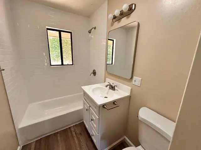 a bathroom with a sink toilet and tub